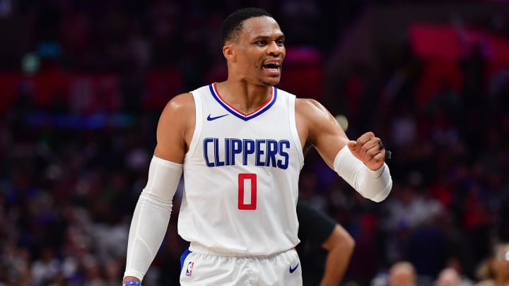 Jan 21, 2024; Los Angeles, California, USA; Los Angeles Clippers guard Russell Westbrook (0) celebrates the victory against the Brooklyn Nets at Crypto.com Arena. Mandatory Credit: Gary A. Vasquez-USA TODAY Sports