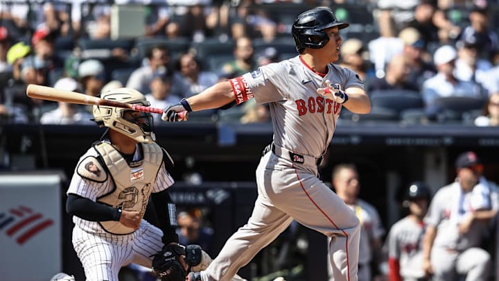 Sep 15, 2024; Bronx, New York, USA; Boston Red Sox designated hitter Masataka Yoshida (7) hits a single in the fourth inning against the New York Yankees at Yankee Stadium. Sep 15, 2024; Bronx, New York, USA; Boston Red Sox designated hitter Masataka Yoshida (7) hits a single in the fourth inning against the New York Yankees at Yankee Stadium.