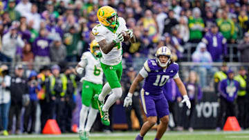 Oregon wide receiver Malik Benson hauls in a touchdown reception as the Oregon Ducks take on the Washington Huskies on Nov. 29, 2025, at Husky Stadium in Seattle, Washington.