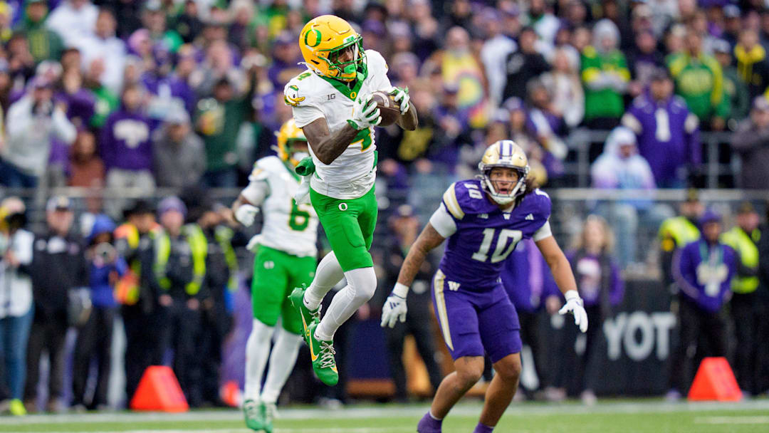 Oregon wide receiver Malik Benson hauls in a touchdown reception as the Oregon Ducks take on the Washington Huskies on Nov. 29, 2025, at Husky Stadium in Seattle, Washington.