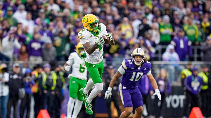 Benson's breezin': Oregon receiver Malik Benson grabbed a deep route over the middle and zoomed 64 yards for a touchdown in the fourth quarter as the Ducks beat Dubs Down in the 2025 rivalry game.