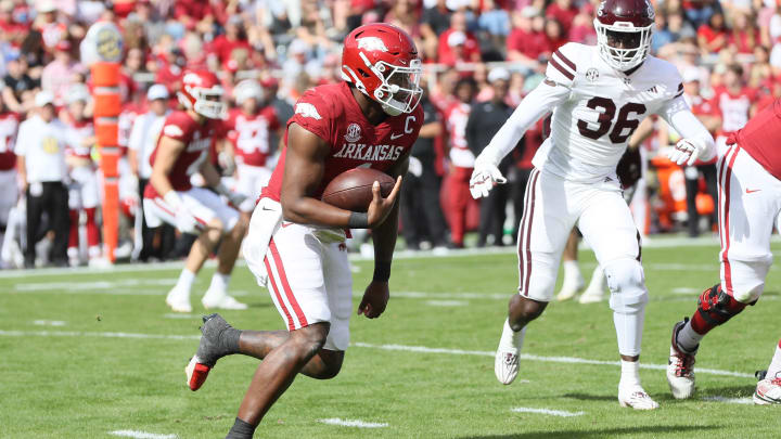 Oct 21, 2023; Fayetteville, Arkansas, USA;  Arkansas Razorbacks quarterback KJ Jefferson (1) runs the ball against the Mississippi State Bulldogs in the second quarter at Donald W. Reynolds Razorback Stadium. Mandatory Credit: Nelson Chenault-USA TODAY Sports