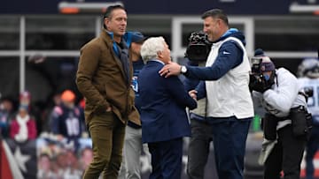 Nov 28, 2021; Foxborough, Massachusetts, USA;  Tennessee Titans head coach Mike Vrabel shakes the hand of New England Patriots owner Robert Kraft while former Patriots quarterback looks on during pregame at Gillette Stadium. Mandatory Credit: Bob DeChiara-Imagn Images