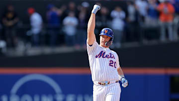 Apr 23, 2025; New York City, New York, USA; New York Mets first baseman Pete Alonso (20) celebrates his game tying RBI double against the Philadelphia Phillies during the tenth inning at Citi Field. Mandatory Credit: Brad Penner-Imagn Images