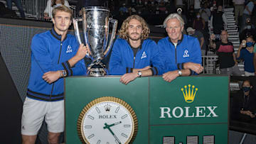 Team Europe players Alexander Zverev (far left) and Stefanos Tsitsipas (middle) and Team Europe Captain Bjorn Borg (right) with the Laver Cup at TD Garden on Sept. 26, 2021.