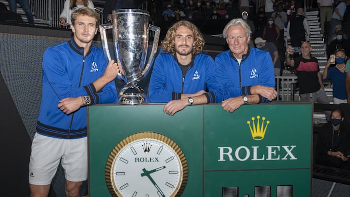 Team Europe players Alexander Zverev (far left) and Stefanos Tsitsipas (middle) and Team Europe Captain Bjorn Borg (right) with the Laver Cup at TD Garden on Sept. 26, 2021.