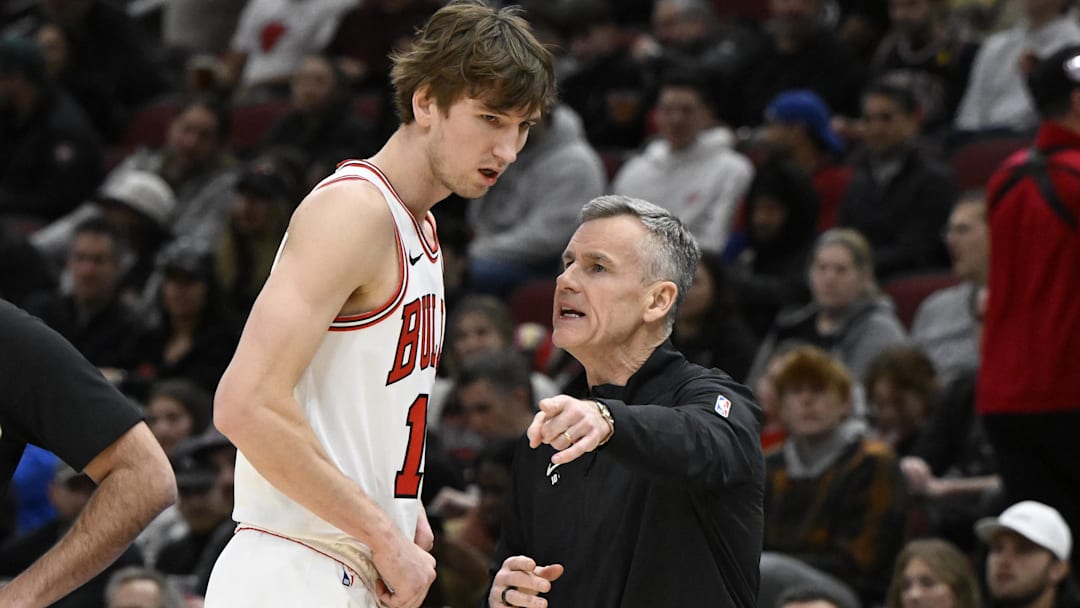 Feb 12, 2025; Chicago, Illinois, USA;  Chicago Bulls forward Matas Buzelis (14) talks with head coach Billy Donovan during the first half against the Detroit Pistons at the United Center. Mandatory Credit: Matt Marton-Imagn Images