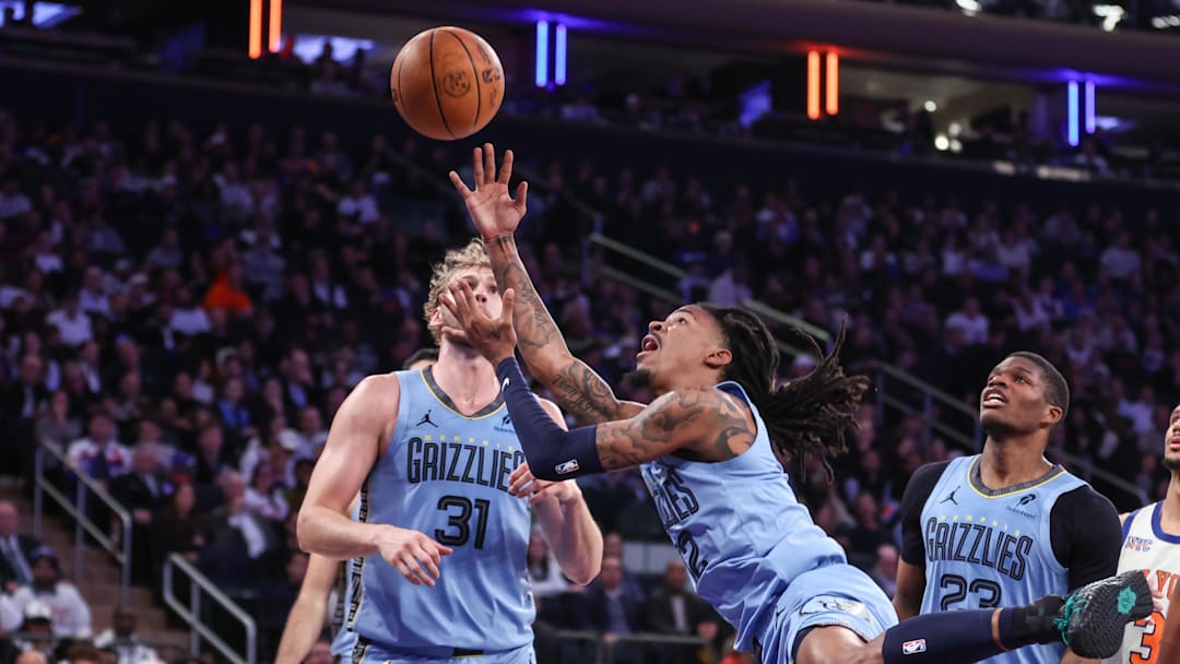 Nov 11, 2025; New York, New York, USA;  Memphis Grizzlies guard Ja Morant (12) drives to the basket in the third quarter against the New York Knicks at Madison Square Garden. Mandatory Credit: Wendell Cruz-Imagn Images
