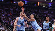 Nov 11, 2025; New York, New York, USA;  Memphis Grizzlies guard Ja Morant (12) drives to the basket in the third quarter against the New York Knicks at Madison Square Garden. Mandatory Credit: Wendell Cruz-Imagn Images