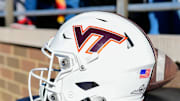 Nov 11, 2023; Chestnut Hill, Massachusetts, USA; A Virginia Tech Hokies helmet rest on a table during the first half against the Boston College Eagles at Alumni Stadium. Mandatory Credit: Eric Canha-Imagn Images