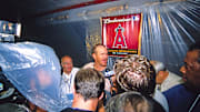 Jun 29, 2002; Anaheim, CA, USA; FILE PHOTO; Anaheim Angels pitcher Troy Percival (center) talks with media after clinching the 2002 American League Division Series. 