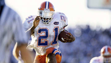 Sep 27, 1997; Lexington, KY, USA; FILE PHOTO; Florida Gators running back  Fred Taylor (21) carries the ball against the Kentucky Wildcats at Commonwealth Stadium. Mandatory Credit: RVR Photos-Imagn Images 