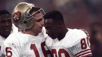 San Francisco 49ers quarterback Joe Montana (16) and wide receiver Jerry Rice (80)