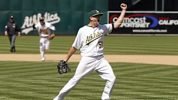 May 9, 2010; Oakland, CA, USA; Oakland Athletics pitcher Dallas Braden (51) celebrates after pitching a perfect game against the Tampa Bay Rays at Oakland-Alameda County Coliseum. The Athletics defeated the Rays 4-0. Mandatory Credit: Cary Edmondson-Imagn Images