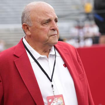 Former UW athletic director Barry Alvarez walks the sidelines before the Badgers' game against Michigan on Saturday at Camp Randall Stadium.