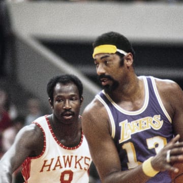 Unknown date; Atlanta, GA, USA; FILE PHOTO; Los Angeles Lakers center Wilt Chamberlain (13) is defended by Atlanta Hawks center Walt Bellamy (8)  during the 1972-73 season at The Omni. Mandatory Credit: Manny Rubio-Imagn Images