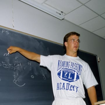 Jul 1997; Thibodaux, LA, USA; FILE PHOTO; Peyton Manning during a classroom session at the Manning passing academy. Mandatory Credit: Michael C. Hebert-USA TODAY Sports