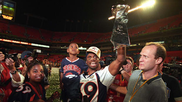Broncos cornerback Ray Crockett (39) celebrates after defeating the Falcons during Super Bowl XXXIII in 1999. 