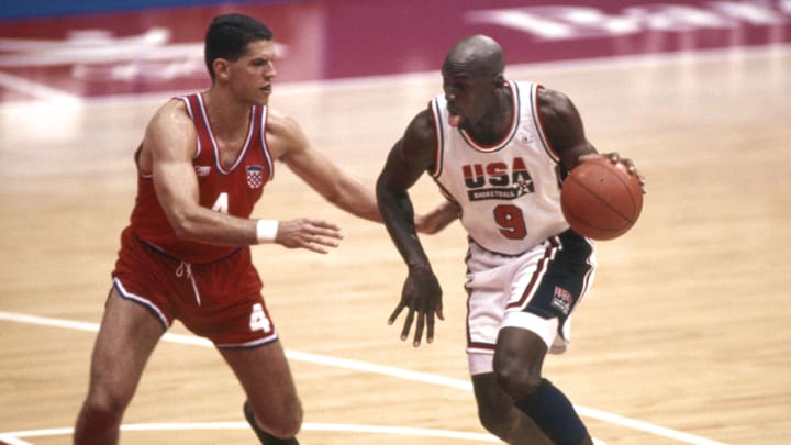 Aug 8, 1992; Badalona, SPAIN; FILE PHOTO; USA Dream Team guard Michael Jordan (9) is defended by Croatia guard Drazen Petrovic (4) in the mens basketball gold medal game during the 1992 Barcelona Olympic Games at Pavello Olympic Arena. Mandatory Credit: Richard Mackson-USA TODAY SPORTS 