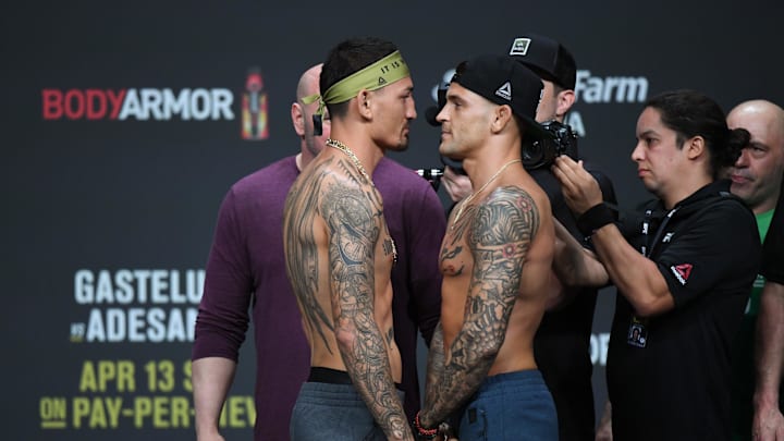 Max Holloway and Dustin Poirier during weigh ins for UFC 236 at State Farm Arena. 