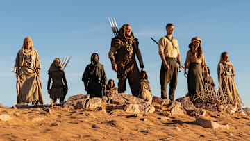 A group of Aiel with Rand (Josha Stradowski), Moiraine (Rosamund Pike) and Lan (Daniel Henney), which includes Bair (Nukâka Coster-Waldau) and Rhuarc (Björn Landberg). Image: Prime Video.