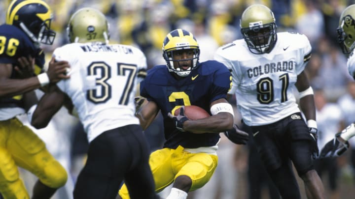 1997; Ann Arbor, MI, USA; FILE PHOTO; Michigan Wolverines cornerback (2) Charles Woodson in action against the Colorado Buffaloes at Michigan Stadium. Mandatory Credit: Photo By USA TODAY Sports