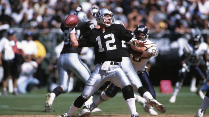 Sep 3, 2000; Oakland, CA, USA; FILE PHOTO; Oakland Raiders quarterback Rich Gannon (12) in action against the San Diego Chargers at Oakland-Alameda County Coliseum. Mandatory Credit: Peter Brouillet-USA TODAY NETWORK