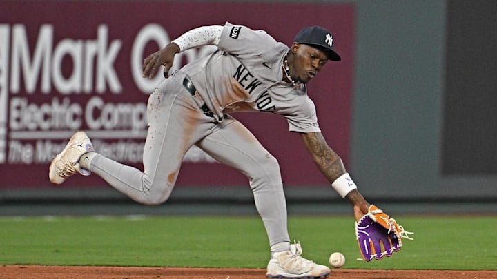 Jun 10, 2025; Kansas City, Missouri, USA;  New York Yankees third baseman Jazz Chisholm Jr. (13) fields a ground ball in the sixth inning against the Kansas City Royals at Kauffman Stadium. Mandatory Credit: Peter Aiken-Imagn Images