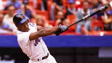 Aug 22, 1999; Flushing, NY, USA; FILE PHOTO; New York Mets outfielder Rickey Henderson (24) in action against the St. Louis Cardinals at Shea Stadium. 