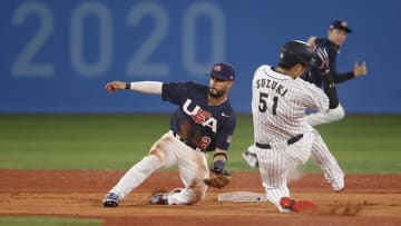 Aug 7, 2021; Yokohama, Japan; Team Japan outfielder Seiya Suzuki (51) steals second base ahead of