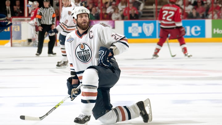 Jun 7, 2006; Raleigh, NC, USA; Edmonton Oilers defenseman Jason Smith (21) on the ice against the Carolina Hurricanes during game two of the Stanley Cup Finals at RBC Center. Credit: Lou Capozzola-USA TODAY NETWORK