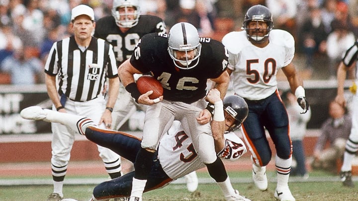 Dec 27, 1987; Los Angeles, CA, USA; FILE PHOTO; Los Angeles Raiders tight end Todd Christensen (46) in action against Chicago Bears defensive back James Davis (45) at Los Angeles Memorial Coliseum. Mandatory Credit: Peter Brouillet-USA TODAY NETWORK