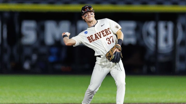 Jun 9, 2024; Lexington, KY, USA; Oregon State Beavers infielder Travis Bazzana (37) throws the ball during the second inning against the Kentucky Wildcats at Kentucky Proud Park. Mandatory Credit: Jordan Prather-USA TODAY Sports