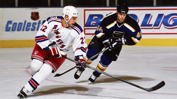 Unknown Date, 2001; New York, NY, USA; FILE PHOTO; New York Rangers defensemen Tomas Kloucek (22) in action against St. Louis Blues right wing Scott Young (48) at Madison Square Garden. Mandatory Credit: Lou Capozzola-USA TODAY NETWORK Unknown Date, 2001; New York, NY, USA; FILE PHOTO; New York Rangers defensemen Tomas Kloucek (22) in action against St. Louis Blues right wing Scott Young (48) at Madison Square Garden. Mandatory Credit: Lou Capozzola-USA TODAY NETWORK