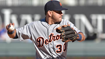 Former Detroit Tigers shortstop Eugenio Suarez (30) turns to make a throw to first against the Kansas City Royals during the eighth inning at Kauffman Stadium.
