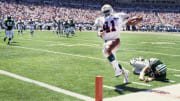 Miami Dolphins running back Keith Byars (41) scores a touchdown against the New York Jets in 1994.