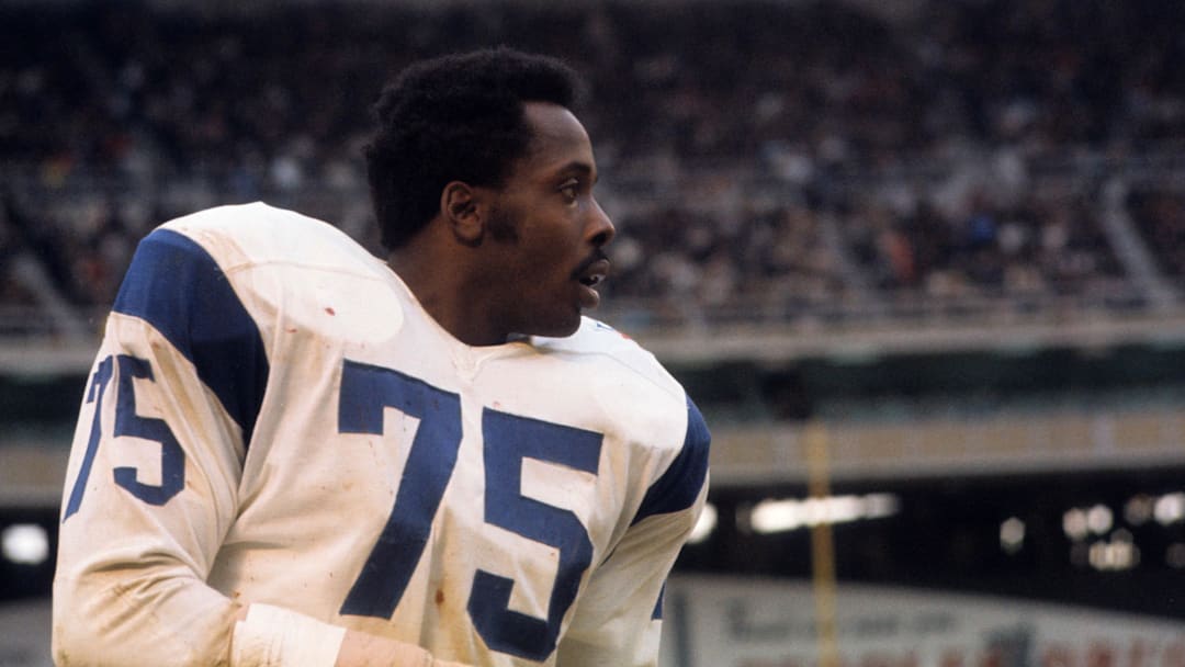 Nov 30, 1969; Washington, DC, USA; FILE PHOTO; Los Angeles Rams defensive tackle Deacon Jones on the sideline against the Washington Redskins at RFK Stadium. Mandatory Credit: Dick Raphael-Imagn Images