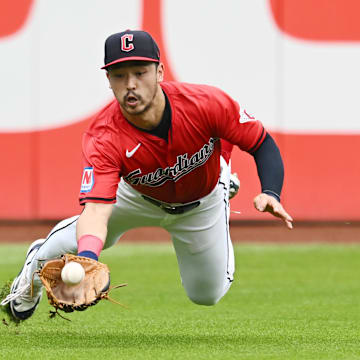 Aug 25, 2024; Cleveland, Ohio, USA; Cleveland Guardians left fielder Steven Kwan (38) catches a ball hit by Texas Rangers third baseman Ezequiel Duran (not pictured) during the third inning at Progressive Field. Mandatory Credit: Ken Blaze-Imagn Images