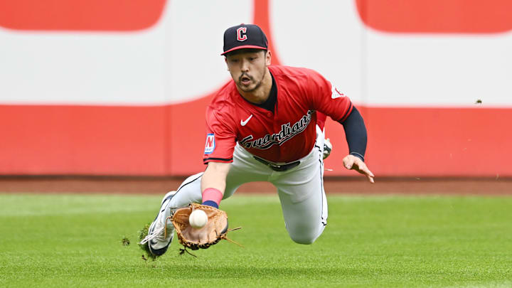 Aug 25, 2024; Cleveland, Ohio, USA; Cleveland Guardians left fielder Steven Kwan (38) catches a ball hit by Texas Rangers third baseman Ezequiel Duran (not pictured) during the third inning at Progressive Field. Mandatory Credit: Ken Blaze-Imagn Images