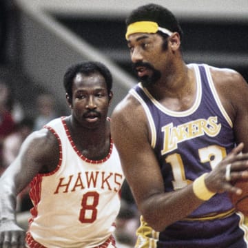 Unknown date; Atlanta, GA, USA; FILE PHOTO; Los Angeles Lakers center Wilt Chamberlain (13) is defended by Atlanta Hawks center Walt Bellamy (8)