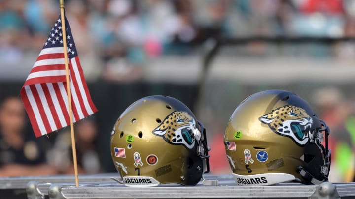 Nov 12, 2017; Jacksonville, FL, USA; Jacksonville Jaguars helmets and a United States flag are seen on the field during a game against the Los Angeles Chargers at EverBank Field. The Jaguars defeated the Chargers 20-17 in overtime. Mandatory Credit: Kirby Lee-USA TODAY Sports