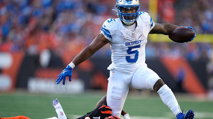 Detroit Lions running back David Montgomery (5) past Cincinnati Bengals DJ Turner, II toward the end zone in the 3rd quarter over the Cincinnati Bengals at Paycor Stadium on October 5, 2025. Detroit Lions running back David Montgomery (5) past Cincinnati Bengals DJ Turner, II toward the end zone in the 3rd quarter over the Cincinnati Bengals at Paycor Stadium on October 5, 2025.