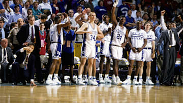 Mar 15, 1992; Birmingham, AL, USA; FILE PHOTO; Kentucky Wildcats forwards John Pelphrey (32) and Jamal Mashburn (24) celebrate their victory against Alabama in the 1992 SEC Tournament at Birmingham Jefferson County Civic Center. Mandatory Credit: Imagn Images