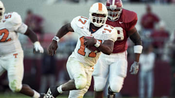 Oct 23, 1999; Tuscaloosa, AL, USA; FILE PHOTO; Tennessee Volunteers quarterback Tee Martin (17) carries the ball against the Alabama Crimson Tide at Bryant-Denny Stadium. Mandatory Credit: RVR Photos-USA TODAY Network