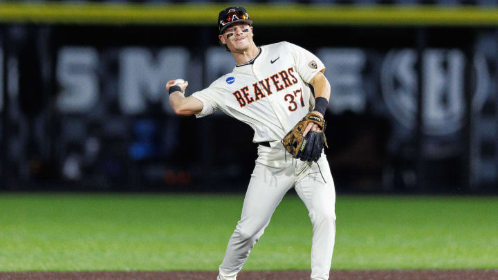 Jun 9, 2024; Lexington, KY, USA; Oregon State Beavers infielder Travis Bazzana (37) throws the ball during the second inning against the Kentucky Wildcats at Kentucky Proud Park. Mandatory Credit: Jordan Prather-USA TODAY Sports