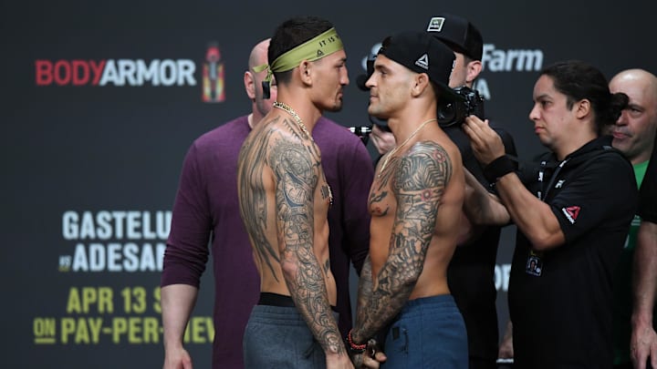 Max Holloway and Dustin Poirier during weigh ins for UFC 236 at State Farm Arena. Max Holloway and Dustin Poirier during weigh ins for UFC 236 at State Farm Arena.