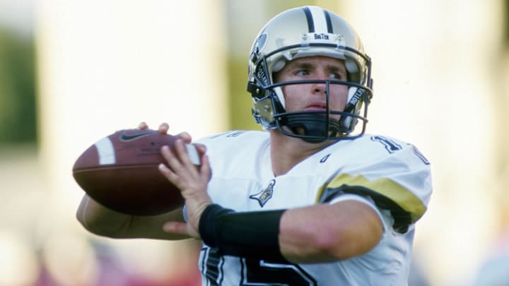 Purdue Boilermakers quarterback Drew Brees (15) warms up 