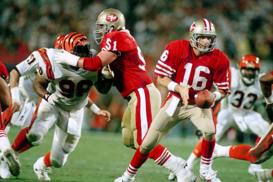 Randy Cross blocks for Joe Montana