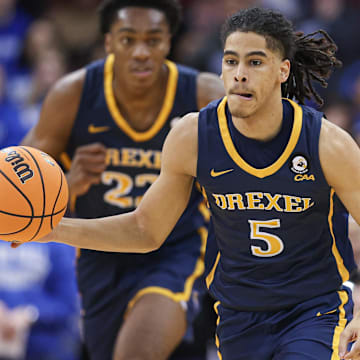 Dec 14, 2022; Newark, New Jersey, USA; Drexel Dragons guard Kobe Magee (5) dribbles up court against the Seton Hall Pirates during the first half at Prudential Center. Mandatory Credit: Vincent Carchietta-Imagn Images