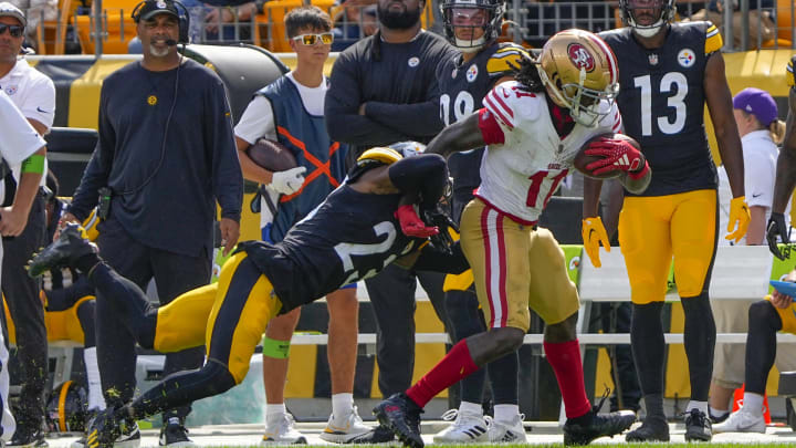 Sep 10, 2023; Pittsburgh, Pennsylvania, USA; San Francisco 49ers wide receiver Brandon Aiyuk (11) is pushed out of bounds by Pittsburgh Steelers safety Damontae Kazee (23) during the second half at Acrisure Stadium. Mandatory Credit: Gregory Fisher-USA TODAY Sports